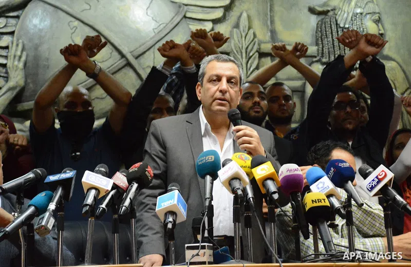 Egyptian Press Syndicate Chief Yahya Qalash reads a statement at the headquarters in the capital Cairo on May 3, 2016 on the occasion of World Press Freedom day, a day after police stormed the headquarters of the journal...