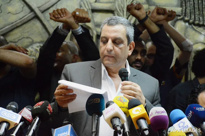 Egyptian Press Syndicate Chief Yahya Qalash reads a statement at the headquarters in the capital Cairo on May 3, 2016 on the occasion of World Press Freedom day, a day after police stormed the headquarters of the journal...