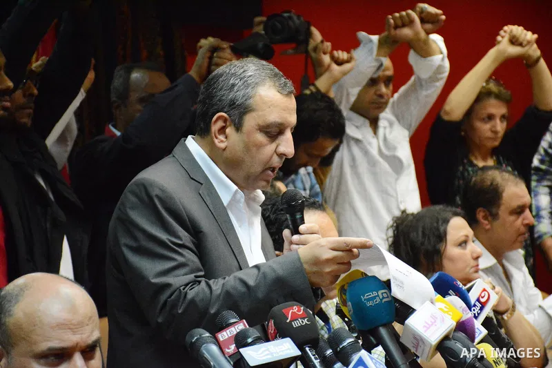 Egyptian Press Syndicate Chief Yahya Qalash reads a statement at the headquarters in the capital Cairo on May 3, 2016 on the occasion of World Press Freedom day, a day after police stormed the headquarters of the journal...