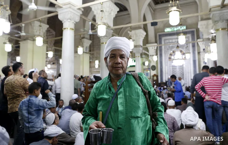 Muslims attend a ritual ceremony to commemorate the birth of Syeda Zainab in Cairo, Egypt, on May 3, 2016. Muslims on Tuesday celebrated the birth of Syeda Zainab who is the granddaughter of Prophet Mohammad, also known...
