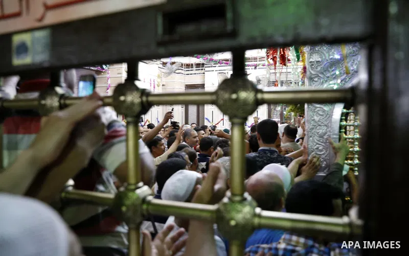Muslims attend a ritual ceremony to commemorate the birth of Syeda Zainab in Cairo, Egypt, on May 3, 2016. Muslims on Tuesday celebrated the birth of Syeda Zainab who is the granddaughter of Prophet Mohammad, also known...