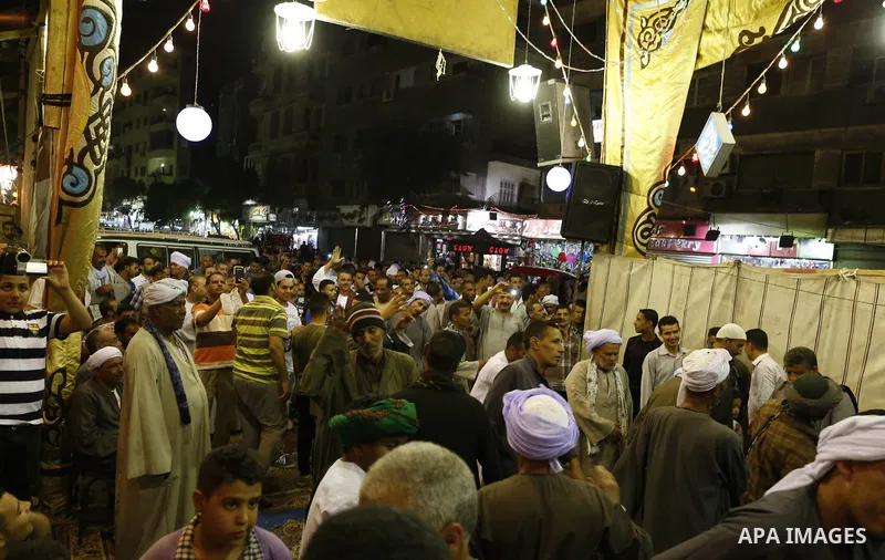 Muslims attend a ritual ceremony to commemorate the birth of Syeda Zainab in Cairo, Egypt, on May 3, 2016. Muslims on Tuesday celebrated the birth of Syeda Zainab who is the granddaughter of Prophet Mohammad, also known...