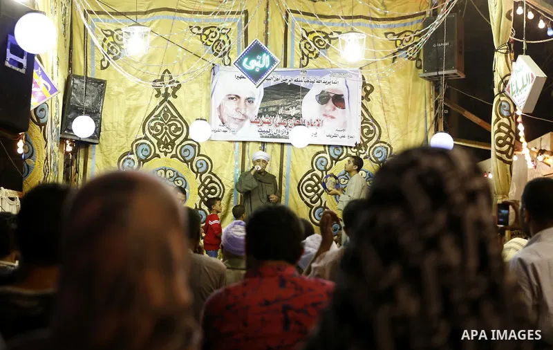 Muslims attend a ritual ceremony to commemorate the birth of Syeda Zainab in Cairo, Egypt, on May 3, 2016. Muslims on Tuesday celebrated the birth of Syeda Zainab who is the granddaughter of Prophet Mohammad, also known...