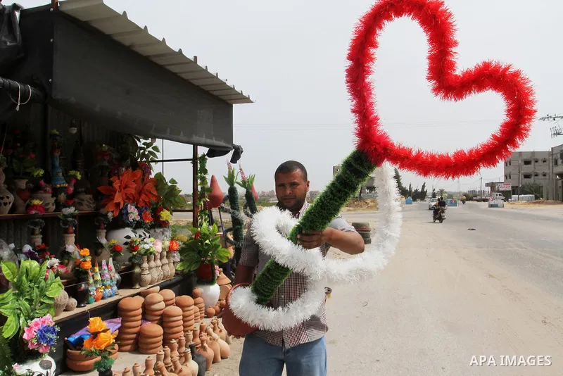A Palestinian man displays handmade vases from pottery, Rafah in the Southern Gaza strip, on May 4, 2016. According to human rights reports, the ongoing Israeli blockade undermines development in all aspects of Palestini...