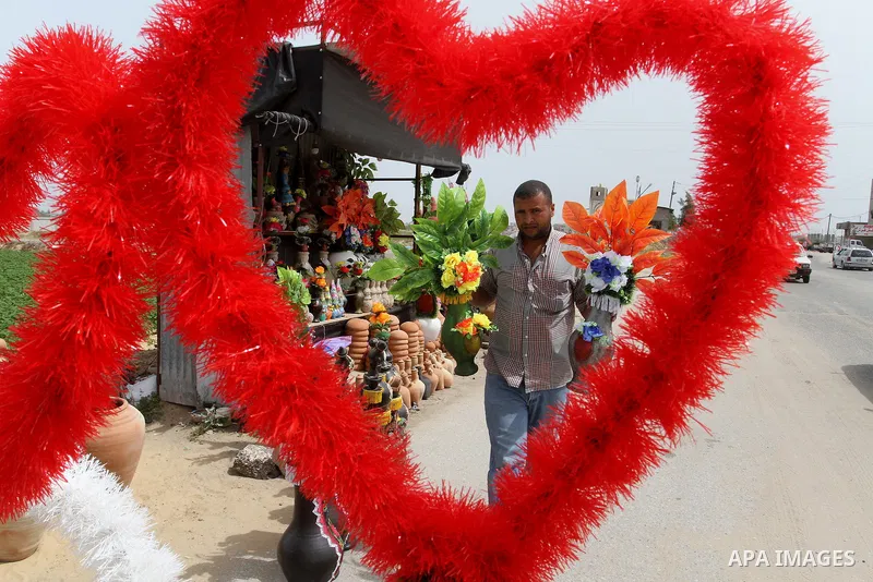 A Palestinian man displays handmade vases from pottery, Rafah in the Southern Gaza strip, on May 4, 2016. According to human rights reports, the ongoing Israeli blockade undermines development in all aspects of Palestini...