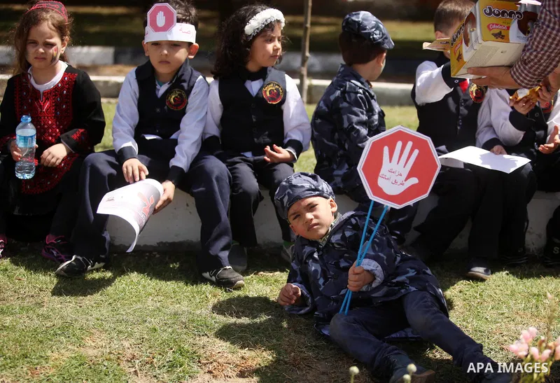 Palestinian children take part during a day where the traffic police have increased presence in the streets to raise traffic awareness in Gaza City on May 4, 2016. Photo by Ashraf Amra