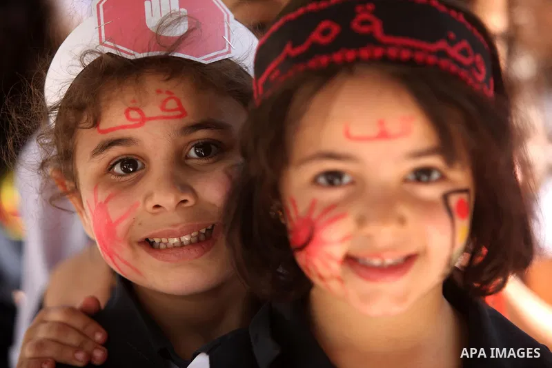 Palestinian children take part during a day where the traffic police have increased presence in the streets to raise traffic awareness in Gaza City on May 4, 2016. Photo by Ashraf Amra
