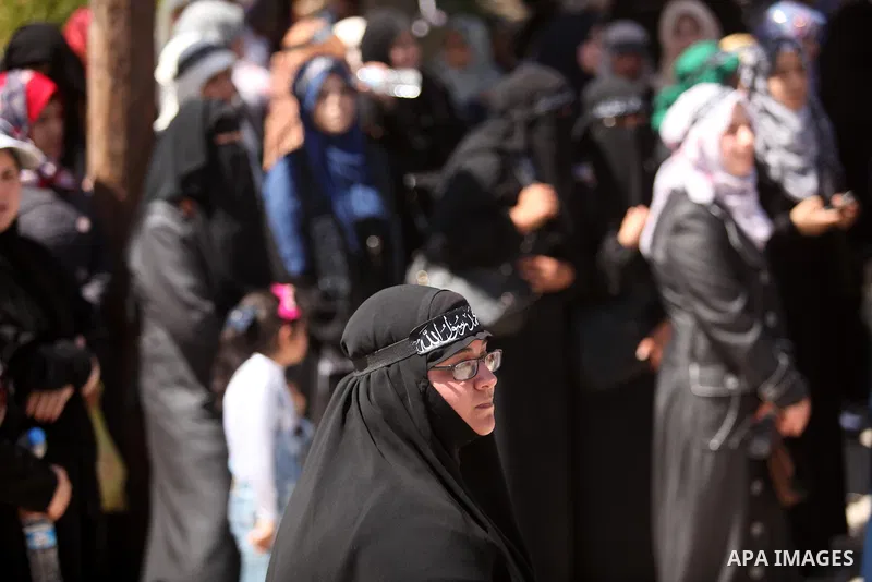 Palestinian supporters of the Islamist party Hizb Ut-Tahrir take part in a rally to mark the 95th anniversary of the overthrow of the Islamic Caliphate, in Gaza city on May 5, 2016. Photo by Ashraf Amra