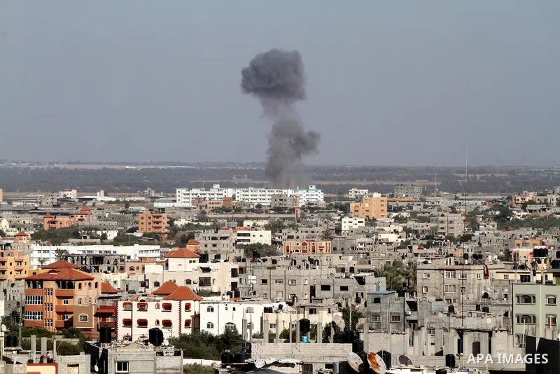 Smoke rises following an Israeli air strike in Rafah, in the southern Gaza Strip, on May 5, 2016. Israeli warplanes struck four new Hamas positions in the southern Gaza Strip, as a flare-up continued to threaten a 2014 c...