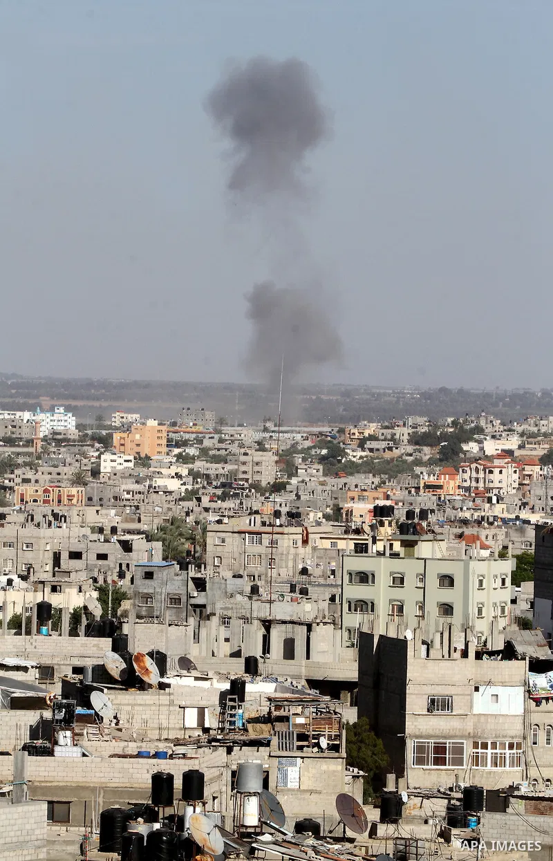 Smoke rises following an Israeli air strike in Rafah, in the southern Gaza Strip, on May 5, 2016. Israeli warplanes struck four new Hamas positions in the southern Gaza Strip, as a flare-up continued to threaten a 2014 c...