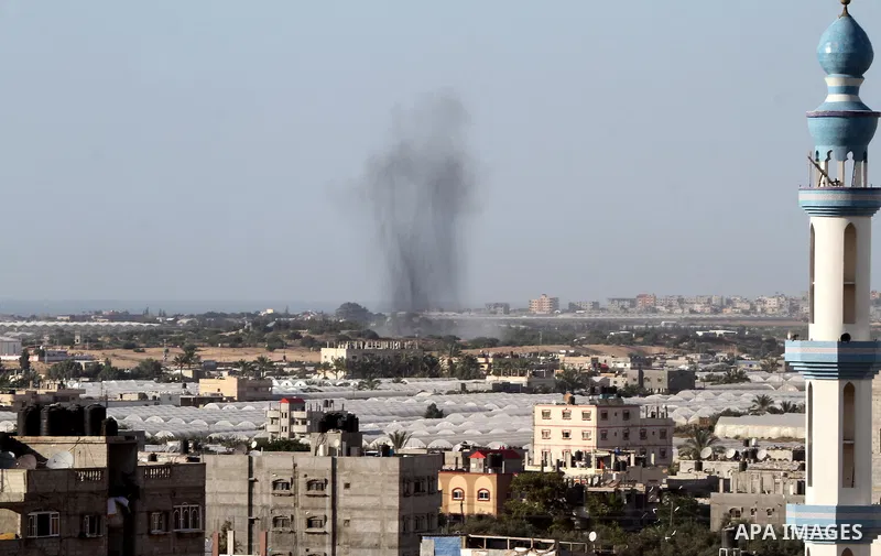 Smoke rises following an Israeli air strike in Rafah, in the southern Gaza Strip, on May 5, 2016. Israeli warplanes struck four new Hamas positions in the southern Gaza Strip, as a flare-up continued to threaten a 2014 c...