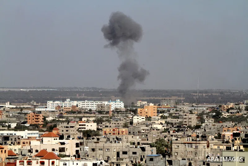 Smoke rises following an Israeli air strike in Rafah, in the southern Gaza Strip, on May 5, 2016. Israeli warplanes struck four new Hamas positions in the southern Gaza Strip, as a flare-up continued to threaten a 2014 c...