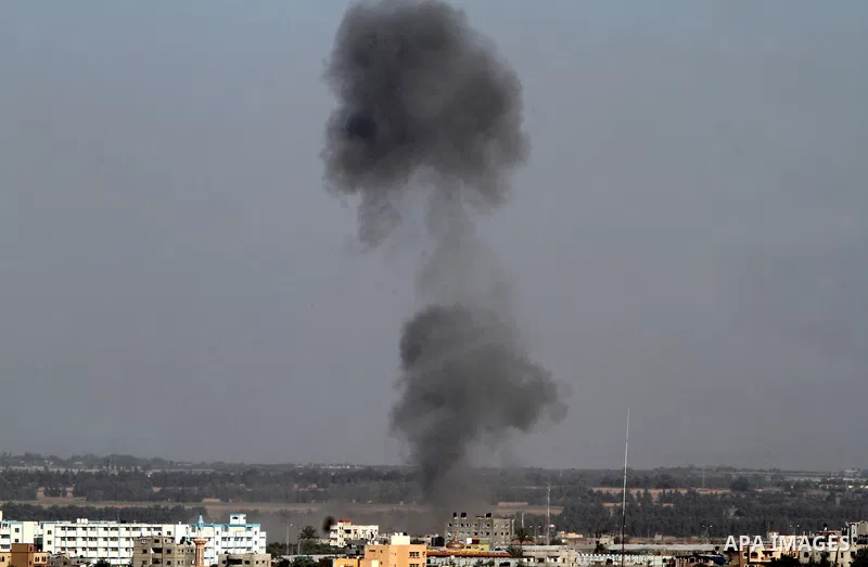 Smoke rises following an Israeli air strike in Rafah, in the southern Gaza Strip, on May 5, 2016. Israeli warplanes struck four new Hamas positions in the southern Gaza Strip, as a flare-up continued to threaten a 2014 c...