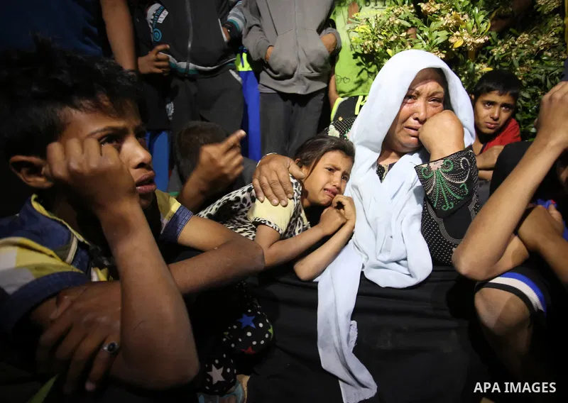 Relatives of Zine al-Umur, 55, who lost her life after Israeli warplanes bombed around Gaza's southern, during a funeral ceremony in east of the Rafah city, Gaza on May 5, 2016.. Photo by Ramadan Elagha