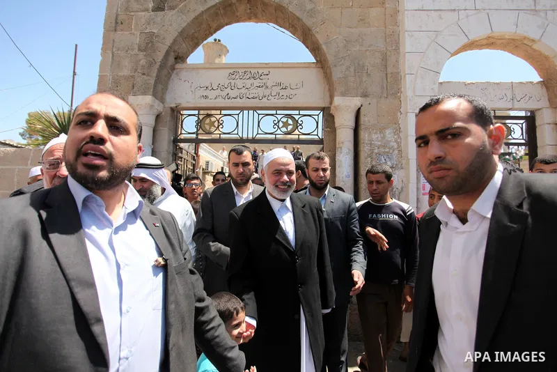 Palestinian Islamist movement Hamas' chief, Ismail Haniya leaves a mosque after giving a speech during the Friday prayer on May 6, 2016 in Deir al-Balah, in the center of the Gaza Strip. Photo by Ashraf Amra