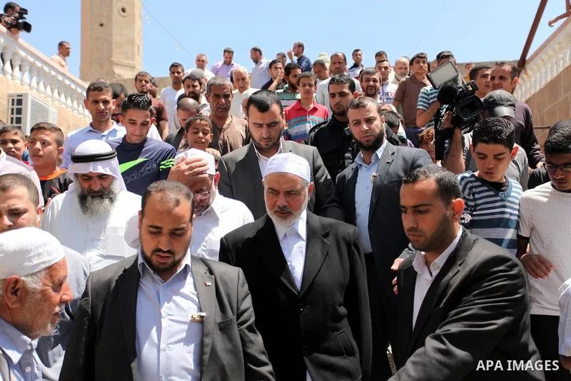 Palestinian Islamist movement Hamas' chief, Ismail Haniya leaves a mosque after giving a speech during the Friday prayer on May 6, 2016 in Deir al-Balah, in the center of the Gaza Strip. Photo by Ashraf Amra