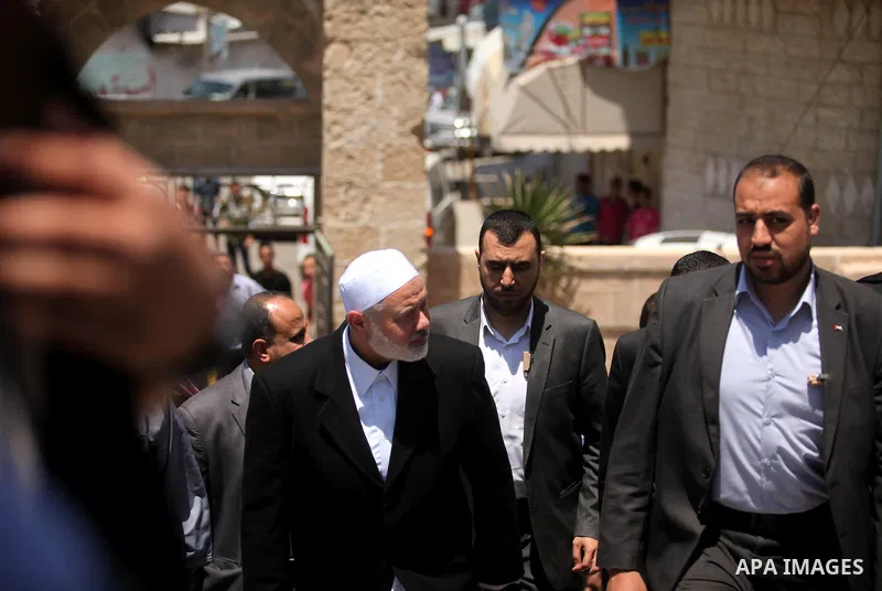 Palestinian Islamist movement Hamas' chief, Ismail Haniya arrives at a mosque during the Friday prayer on May 6, 2016 in Deir al-Balah, in the center of the Gaza Strip. Photo by Ashraf Amra