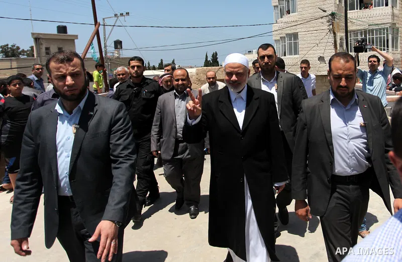 Palestinian Islamist movement Hamas' chief, Ismail Haniya arrives at a mosque during the Friday prayer on May 6, 2016 in Deir al-Balah, in the center of the Gaza Strip. Photo by Ashraf Amra