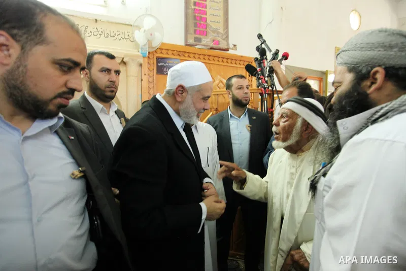 Palestinian Islamist movement Hamas' chief, Ismail Haniya attends the Friday prayer at a mosque on May 6, 2016 in Deir al-Balah, in the center of the Gaza Strip. Photo by Ashraf Amra