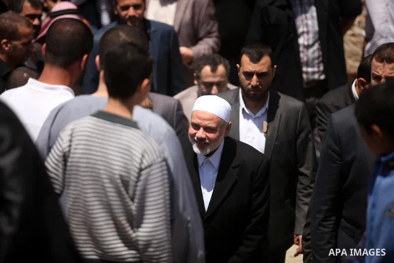 Palestinian Islamist movement Hamas' chief, Ismail Haniya arrives at a mosque during the Friday prayer on May 6, 2016 in Deir al-Balah, in the center of the Gaza Strip. Photo by Ashraf Amra