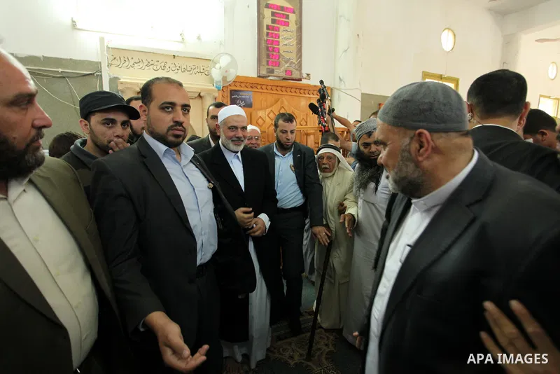 Palestinian Islamist movement Hamas' chief, Ismail Haniya attends the Friday prayer at a mosque on May 6, 2016 in Deir al-Balah, in the center of the Gaza Strip. Photo by Ashraf Amra