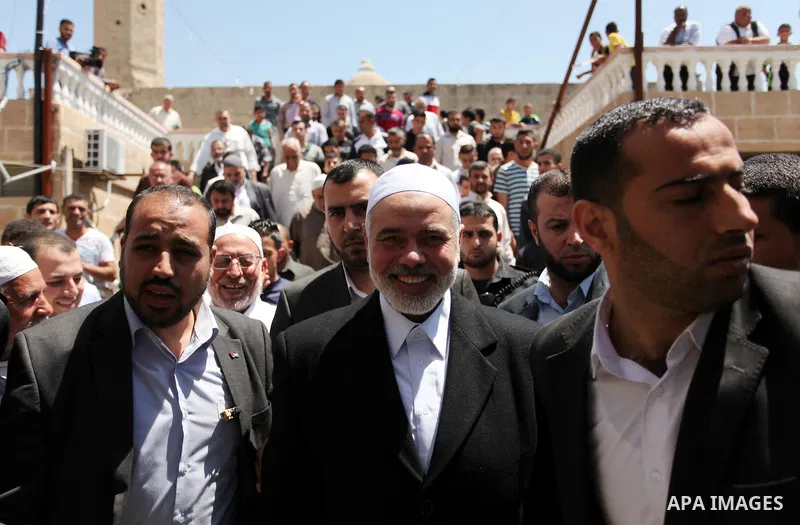 Palestinian Islamist movement Hamas' chief, Ismail Haniya leaves a mosque after giving a speech during the Friday prayer on May 6, 2016 in Deir al-Balah, in the center of the Gaza Strip. Photo by Ashraf Amra