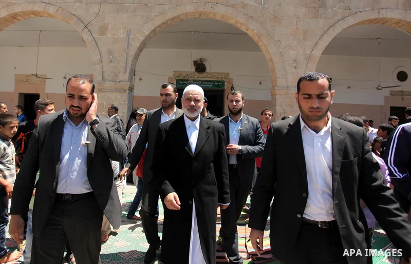 Palestinian Islamist movement Hamas' chief, Ismail Haniya leaves a mosque after giving a speech during the Friday prayer on May 6, 2016 in Deir al-Balah, in the center of the Gaza Strip. Photo by Ashraf Amra