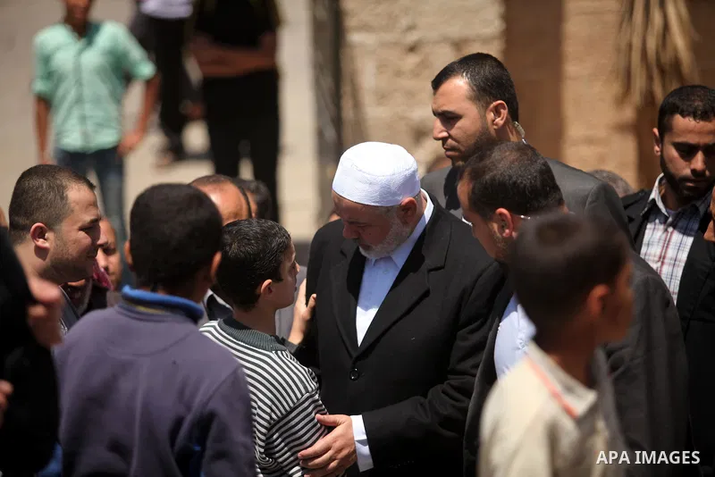 Palestinian Islamist movement Hamas' chief, Ismail Haniya arrives at a mosque during the Friday prayer on May 6, 2016 in Deir al-Balah, in the center of the Gaza Strip. Photo by Ashraf Amra