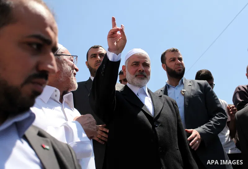 Palestinian Islamist movement Hamas' chief, Ismail Haniya leaves a mosque after giving a speech during the Friday prayer on May 6, 2016 in Deir al-Balah, in the center of the Gaza Strip. Photo by Ashraf Amra