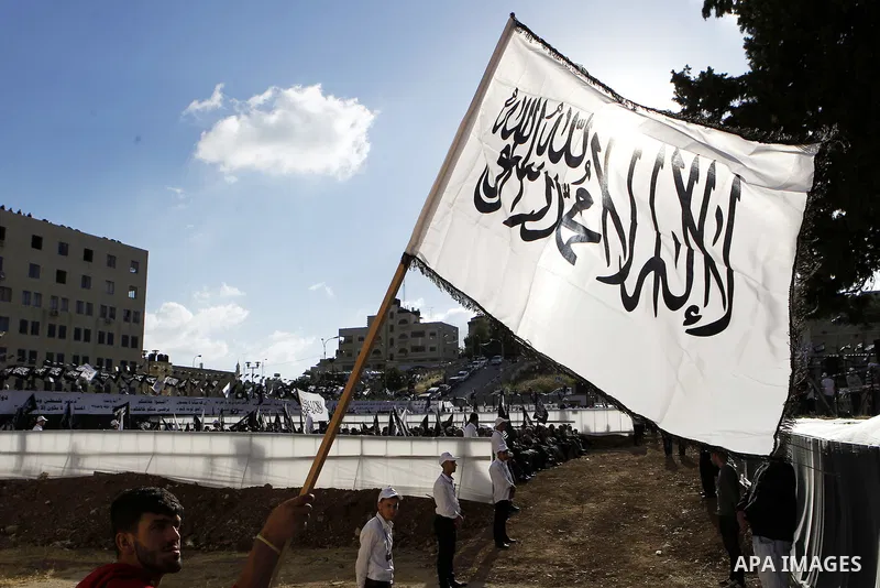 Palestinian supporters of the Islamist party Hizb Ut-Tahrir take part in a rally to mark the 95th anniversary of the overthrow of the Islamic Caliphate, in the West Bank city of Hebron on May 7, 2016. Photo by Wisam Hash...