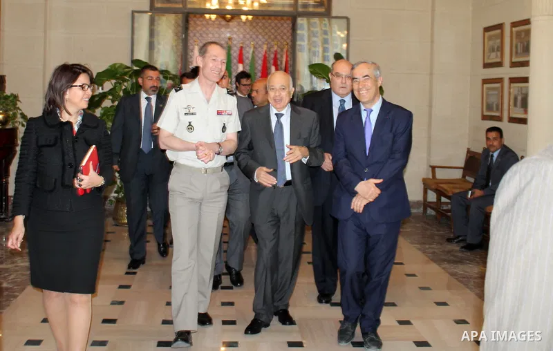 Arab League Secretary General Nabil al-Arabi meets with a delegation from the French Ministry of Defence, in cairo, on May 8, 2016. Photo by Stringer