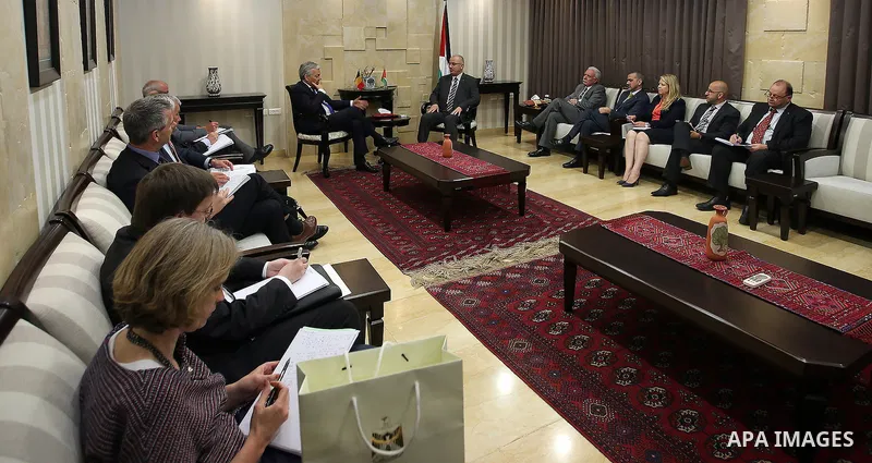 Palestinian Prime Minister Rami Hamdallah, meets with deputy Prime Minister and Minister of Foreign Affairs of Belgium Didier Reynders, in the West bank city of Ramallah, on May 8, 2016. Photo by Prime Minister Office