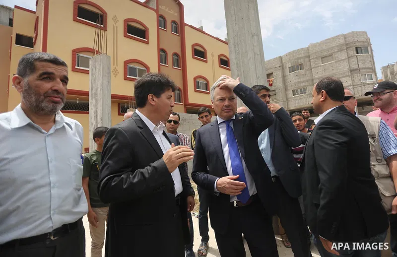 Belgian Foreign Minister Didier Reynders visits the eastern Gaza City Shujaiya neighbourhood which was destroyed during the 50-day war between Israel and Hamas militants in the summer of 2014, during an official visit in...