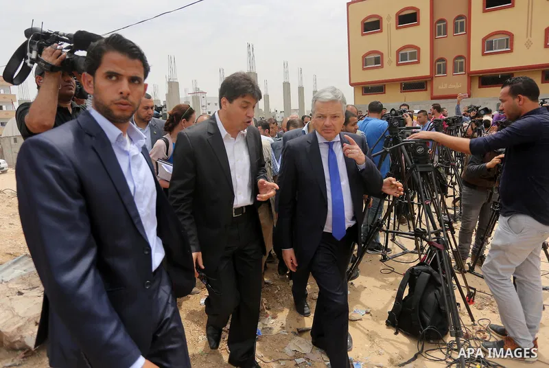 Belgian Foreign Minister Didier Reynders visits the eastern Gaza City Shujaiya neighbourhood which was destroyed during the 50-day war between Israel and Hamas militants in the summer of 2014, during an official visit in...