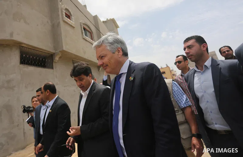 Belgian Foreign Minister Didier Reynders visits the eastern Gaza City Shujaiya neighbourhood which was destroyed during the 50-day war between Israel and Hamas militants in the summer of 2014, during an official visit in...