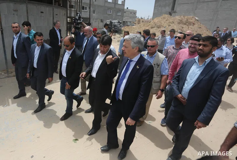 Belgian Foreign Minister Didier Reynders visits the eastern Gaza City Shujaiya neighbourhood which was destroyed during the 50-day war between Israel and Hamas militants in the summer of 2014, during an official visit in...