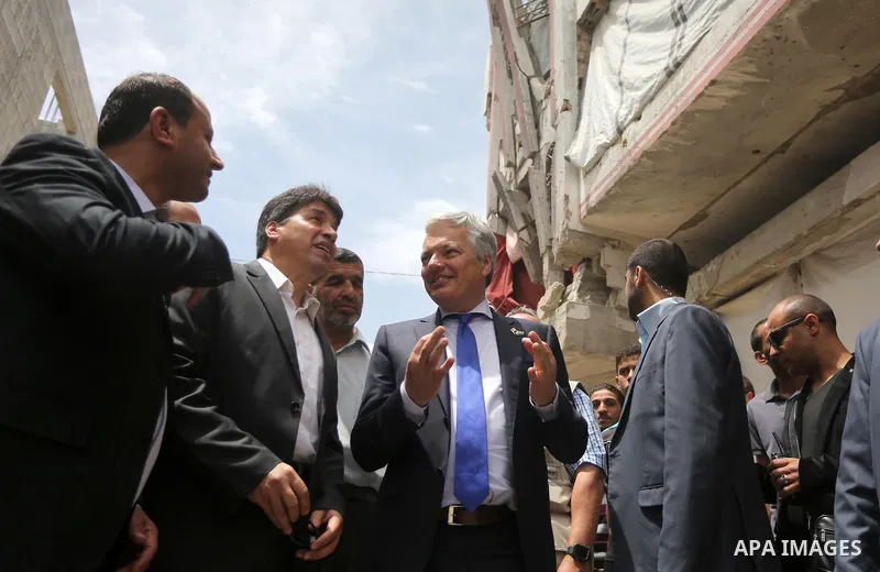 Belgian Foreign Minister Didier Reynders visits the eastern Gaza City Shujaiya neighbourhood which was destroyed during the 50-day war between Israel and Hamas militants in the summer of 2014, during an official visit in...
