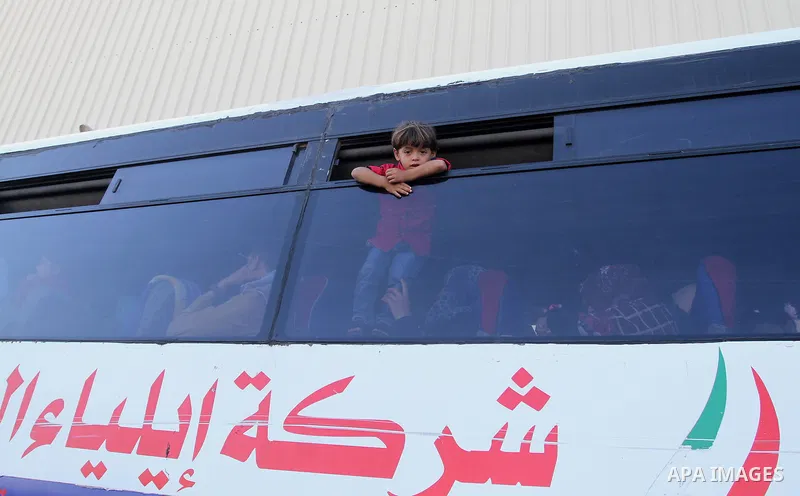 Palestinians wait at the Rafah border crossing with Egypt, in the southern Gaza Strip, after it was opened for two days by Egyptian authorities on May 12, 2016. Israeli Defence Minister Moshe Yaalon announced on May 2, 2...