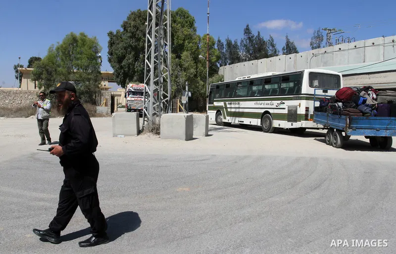 A Palestinian Policeman stands guard on the Rafah border crossing at the southern Gaza Strip on May 12, 2016. Israeli Defence Minister Moshe Yaalon announced on May 2, 2016 the reopening of the Erez crossing point into t...