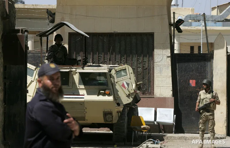 Egyptian soldiers stand guard on the Rafah border crossing at the southern Gaza Strip on May 12, 2016. Israeli Defence Minister Moshe Yaalon announced on May 2, 2016 the reopening of the Erez crossing point into the Pale...