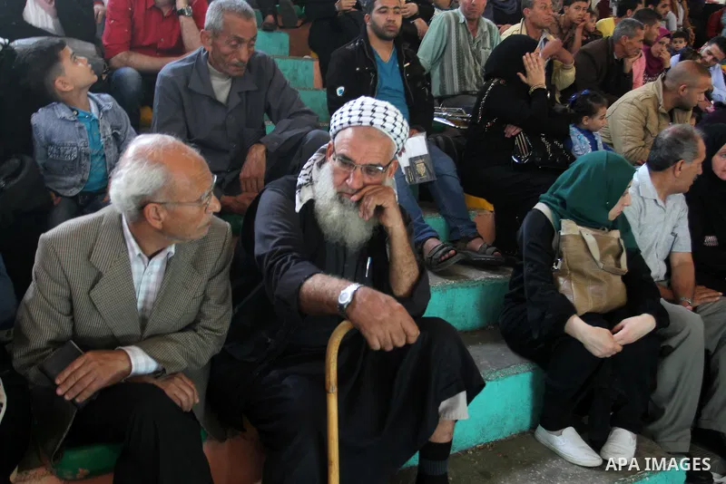 Palestinians wait at the Rafah border crossing with Egypt, in the southern Gaza Strip, after it was opened for two days by Egyptian authorities on May 12, 2016. Israeli Defence Minister Moshe Yaalon announced on May 2, 2...