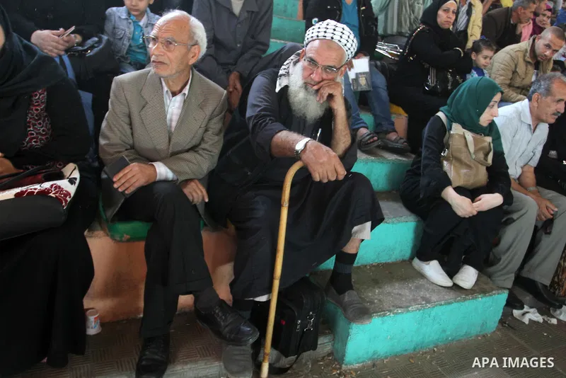 Palestinians wait at the Rafah border crossing with Egypt, in the southern Gaza Strip, after it was opened for two days by Egyptian authorities on May 12, 2016. Israeli Defence Minister Moshe Yaalon announced on May 2, 2...