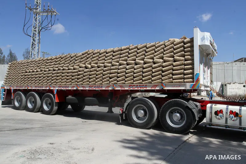 A truck loded with cement enters from Egypt through the Rafah border crossing in southern Gaza Strip on May 12, 2016. Israeli Defence Minister Moshe Yaalon announced on May 2, 2016 the reopening of the Erez crossing poin...