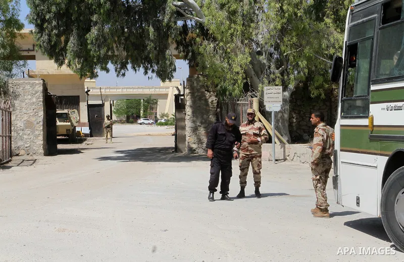 Egyptian soldiers stand guard on the Rafah border crossing at the southern Gaza Strip on May 12, 2016. Israeli Defence Minister Moshe Yaalon announced on May 2, 2016 the reopening of the Erez crossing point into the Pale...