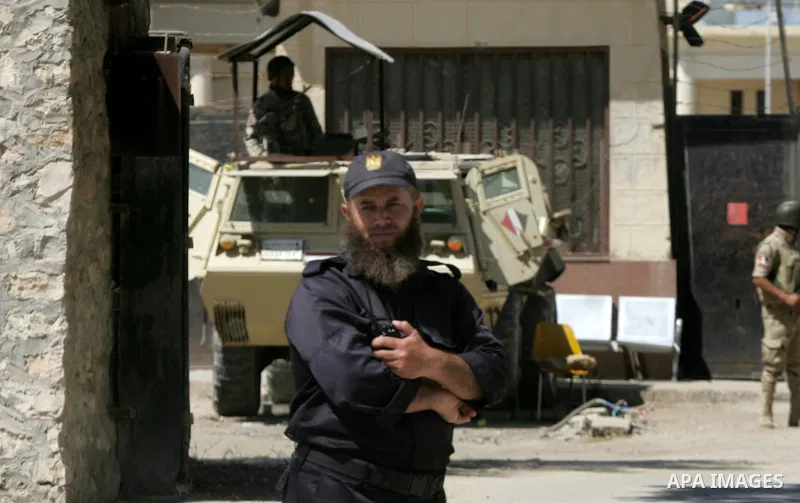 Egyptian soldiers stand guard on the Rafah border crossing at the southern Gaza Strip on May 12, 2016. Israeli Defence Minister Moshe Yaalon announced on May 2, 2016 the reopening of the Erez crossing point into the Pale...