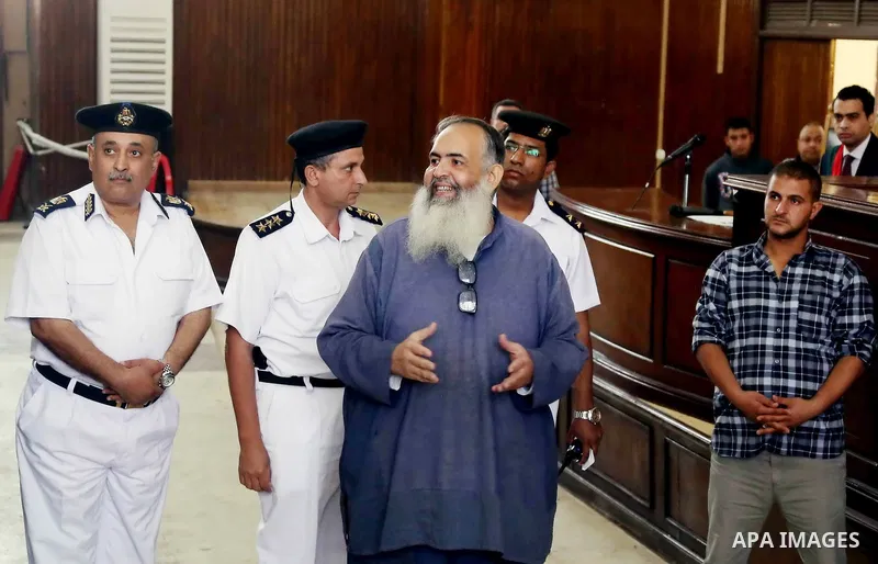 Egypt's Salafi leader and former presidential candidate Hazem Salah Abu Ismail attends his trial and 17 other defendants over charges of imposing Blockade on Nasr City Court in Cairo on May 12, 2016. Photo by Amr Sayed