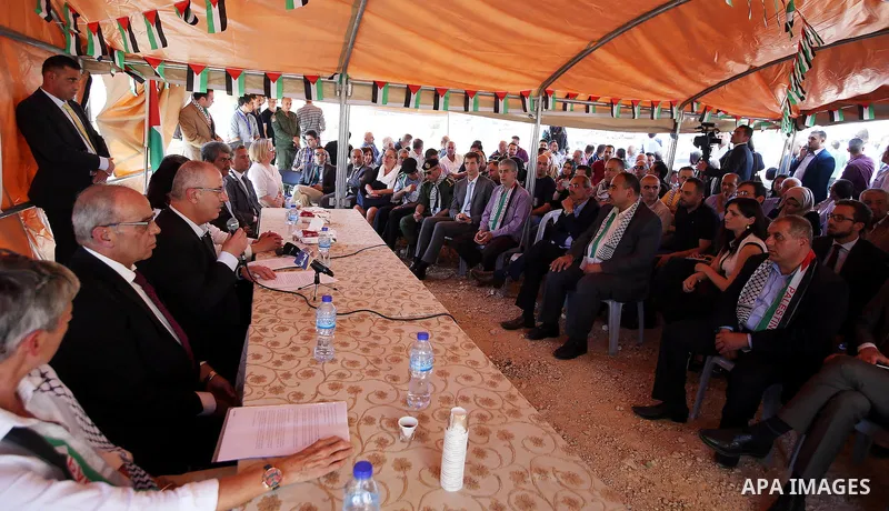 Palestinian Prime Minister Rami Hamdallah visits Palestinians in Khirbet Tana, near the West Bank of Nablus, on May 12, 2016. Photo by Prime Minister Office