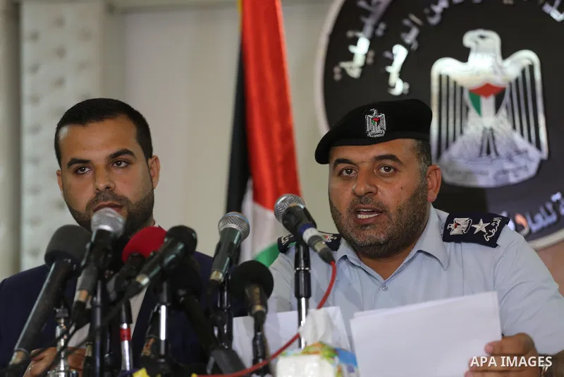 A spokesman for the Palestinian policemen, Ayman Batneeji speaks during a press conference, in Gaza city, on may 14, 2016. Photo by Mohammed Asad