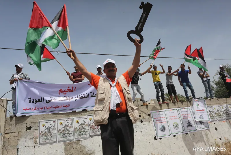 Palestinians wave national flags on May 15, 2016 in Gaza city during a rally to commemorate the "Nakba" or "catastrophe" in Arabic in reference to the establishment in 1948 of the state of Israel. "Nakba" means in Arabic...