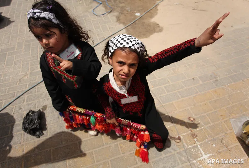 Palestinians wave national flags on May 15, 2016 in Gaza city during a rally to commemorate the "Nakba" or "catastrophe" in Arabic in reference to the establishment in 1948 of the state of Israel. "Nakba" means in Arabic...